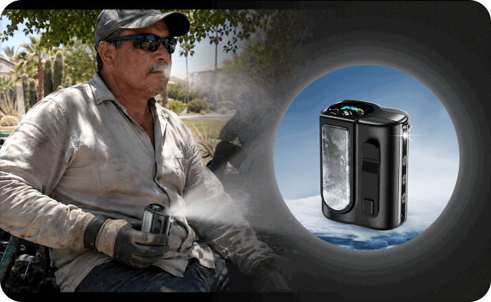 Landscaping crew lead working in the Arizona heat, with the Arctic Clip cooling device beside him