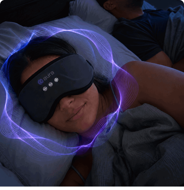 Person sleeping calmly wearing the Aura Sleep Mask