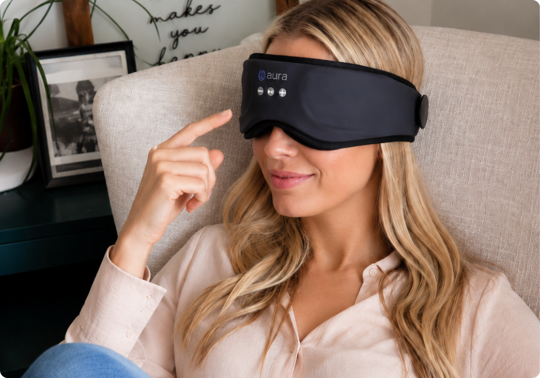 Woman adjusting the AURA mask's front-mounted controls