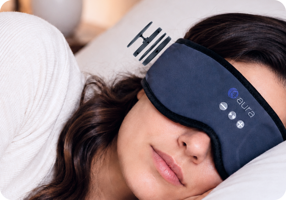 Woman side-sleeping comfortably in the AURA mask