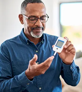 Man checking his blood sugar