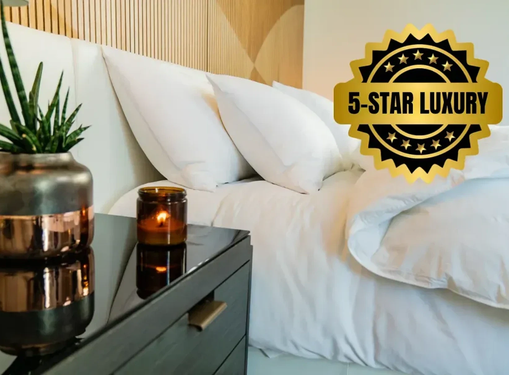 Luxury bedroom with stacked white pillows