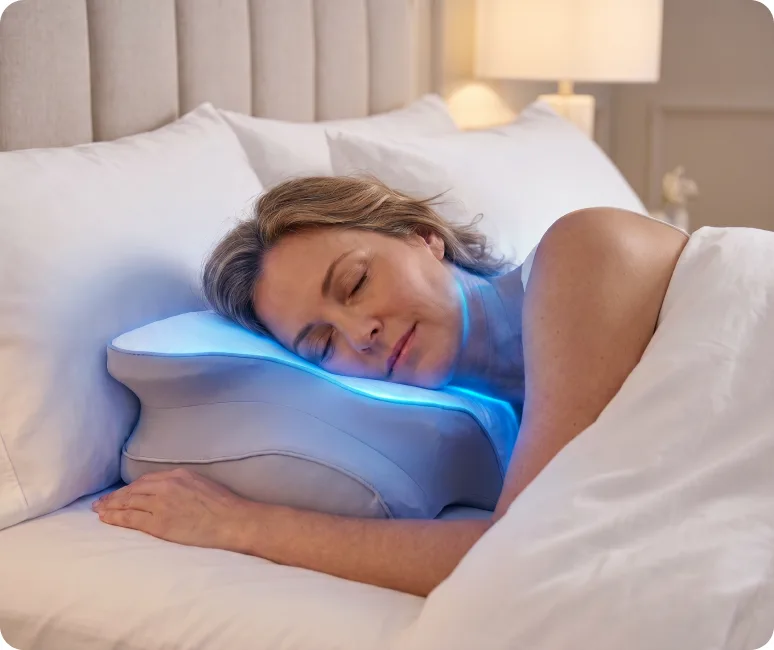 Woman sleeping cool on breathable FluffCo Ergo Pillow
