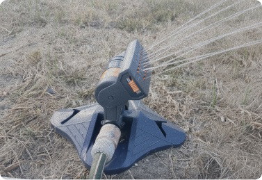 Garden Maestros Pro Sprinkler on a backyard lawn