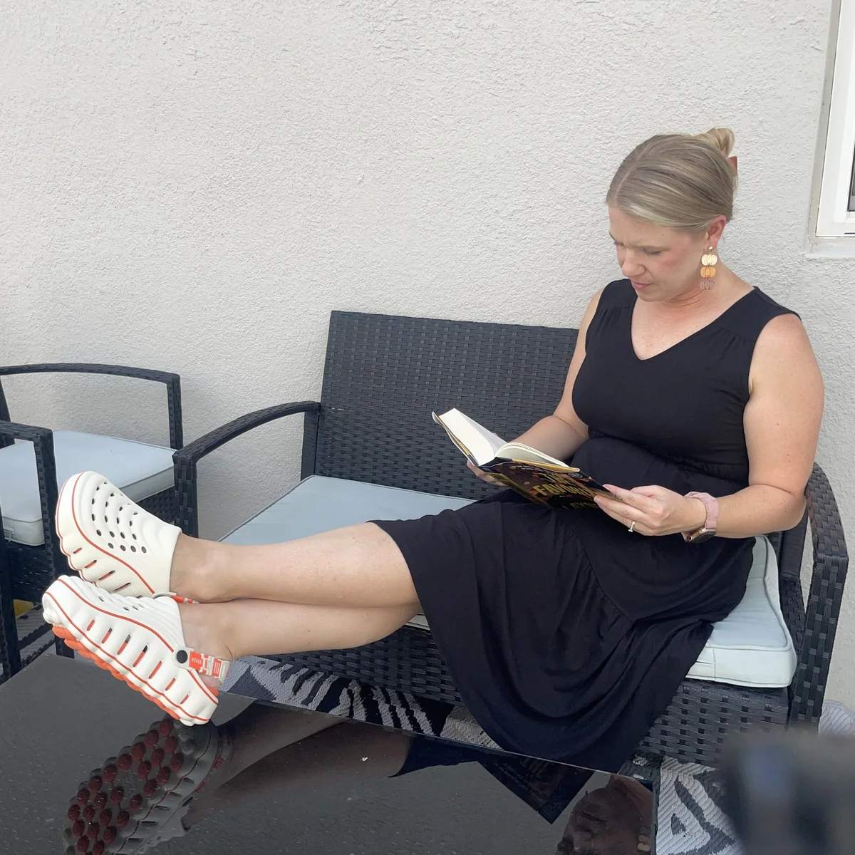 Restore Clogs in White Cloud, feet up while reading