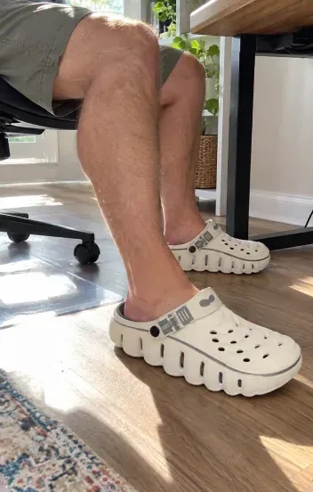 Customer photo: Restore Clogs in White Cloud, worn at a desk