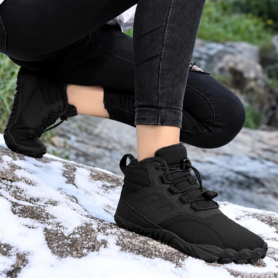 Limitless boots stepping through snow