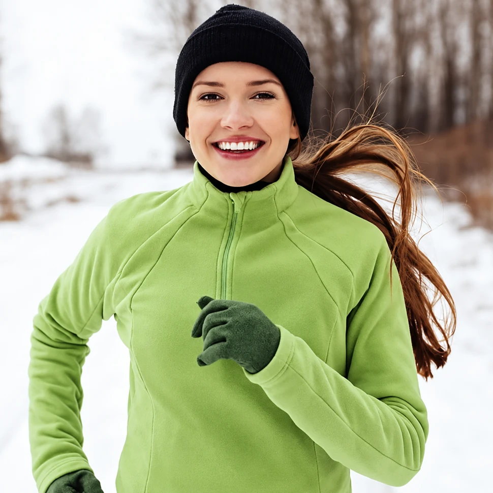 A smiling woman outdoors in winter