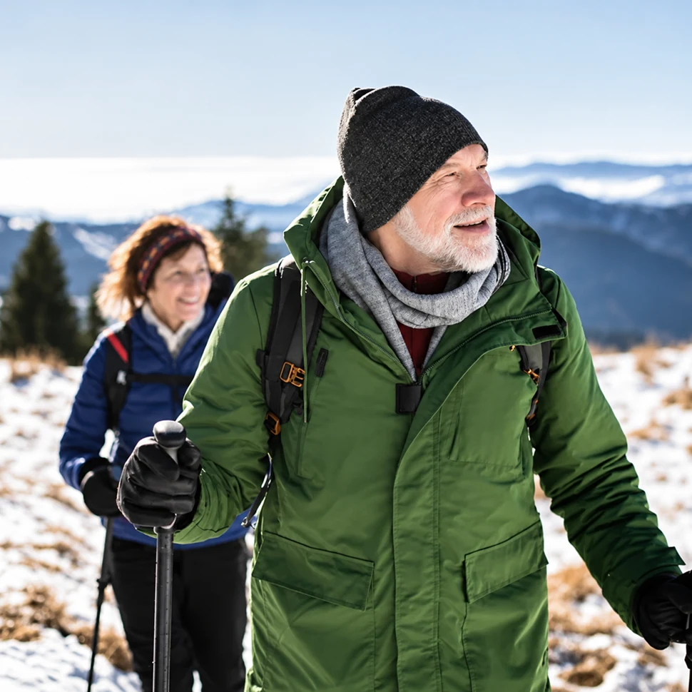 A man hiking in the snow