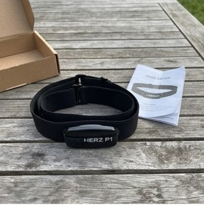 Herz P1 chest strap next to its packaging box