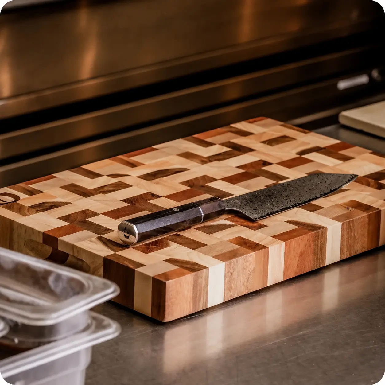 chef knife on end-grain chopping board