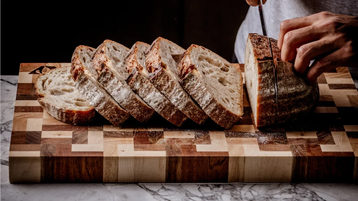 cutting bread with a chef knife