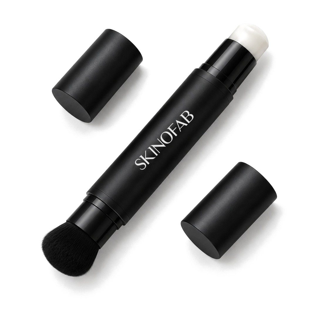 The Adaptive Foundation Stick open at both ends: the white cream and the kabuki brush