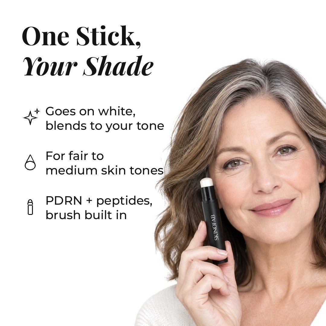 A woman in her fifties holding the Adaptive Foundation Stick