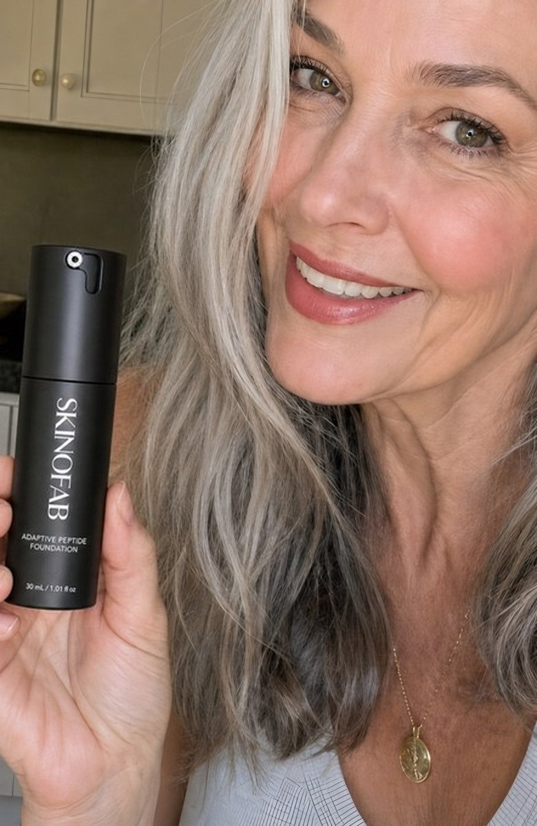 A woman in her fifties taking a selfie with the Adaptive Peptide Foundation