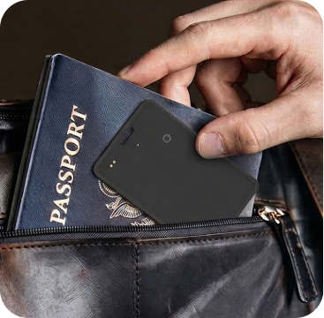 Smart Locator tucked into a passport