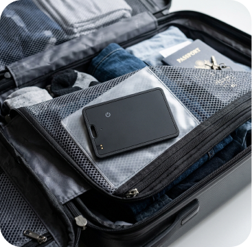 Smart Locator in a packed suitcase