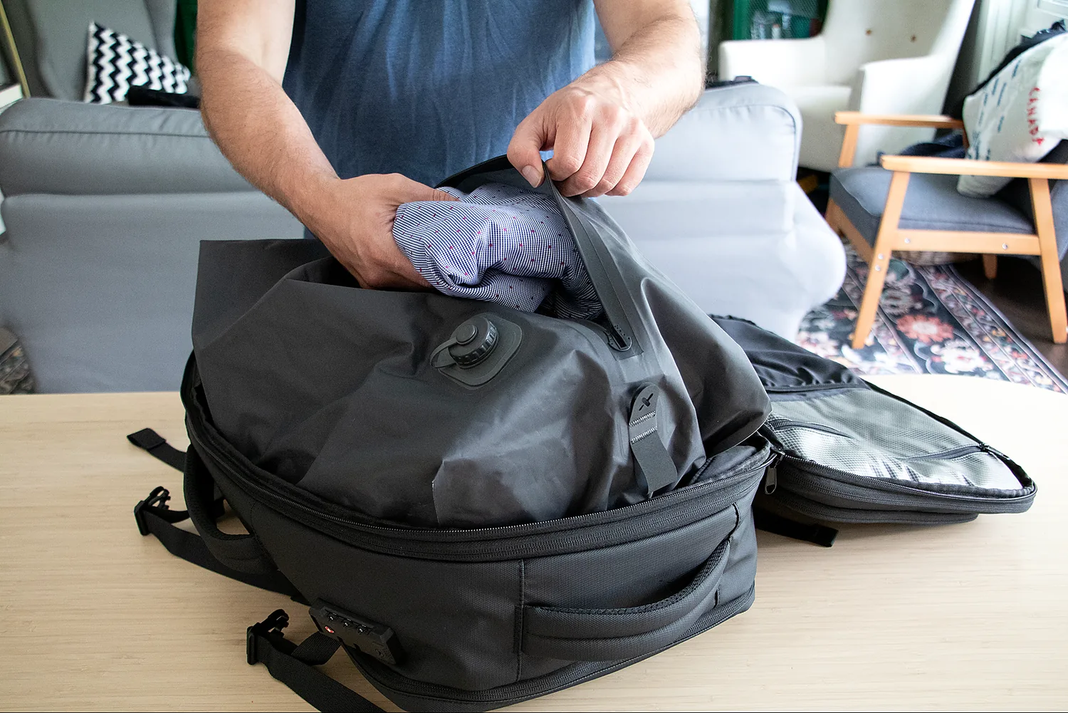 Clothes being packed into the removable compression bag