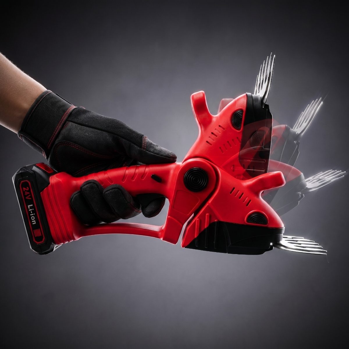 A gloved hand holding the WOODRANGER Power Hedge Trimmer as the cutting head rotates through 90 degrees