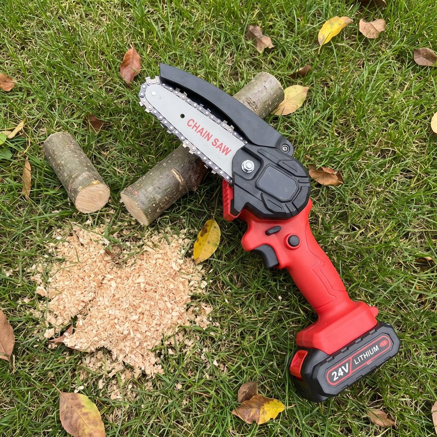 Close-up of the WOODRANGER Mini Chainsaw making a safe, controlled cut